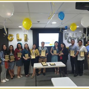 Francis M. Fondevilla, the Forwarding Manager of Globalia Manila, receives a plaque of certification and an award for 15 years of services for the company